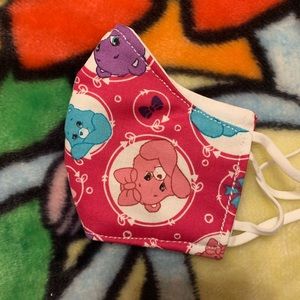 A Care Bears themed face mask